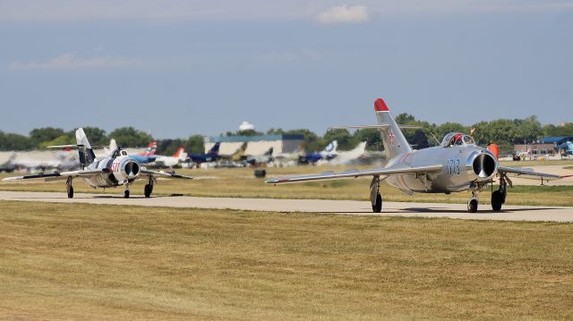 MIKOYAN MiG-17 (N1713P) - Two MiG-17’s taxiing out in front of the flightline for their Friday afternoon performance. br /br /7/28/23