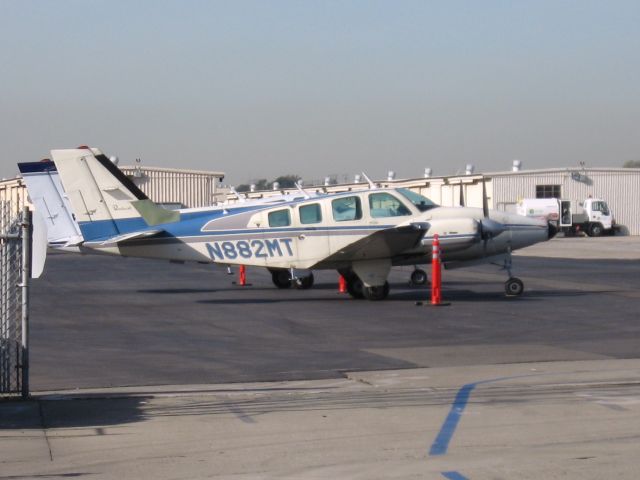 Beechcraft Baron (58) (N882MT) - Parked at Hawthorne