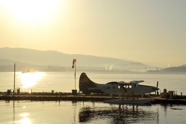 De Havilland Canada DHC-3 Otter (C-GEND) - Whistler Airs DHC3 at Vancouver Harbour with Seabus crossing Burrard Inlet