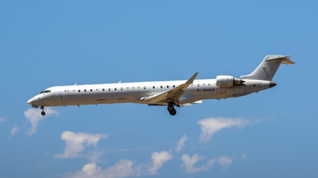 Canadair Regional Jet CRJ-900 (N944LR) - Mesa Airlines CRJ-900 landing at PHX on 7/8/22. Taken with a Canon 850D and Rokinon 135mm f/2 lens.