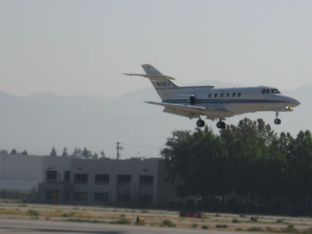 Hawker 800 (N110EJ) - N110EJ about to touch down on 16R coming in from Centennial KAPA.