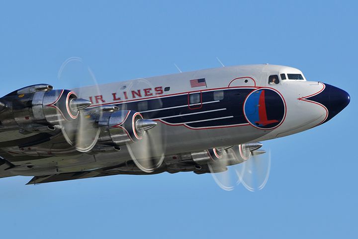 N836D — - Historical Flight Foundations restored Eastern Air Lines DC-7B taking off from its home base at Opa-locka Executive Airport enroute to the EAA AirVenture at Oshkosh with passengers. This was the 4th flight since the almost six year restoration was completed.