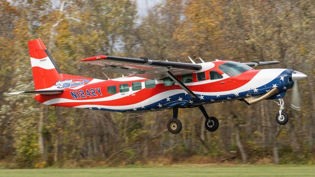 Cessna Caravan (N1242Y) - Another angle I got of N1242Y on its first departure out of College Park to go do holds over FedEx field with skydivers on board. 