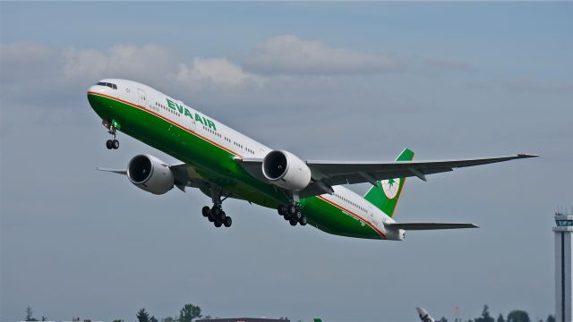 BOEING 777-300 (B-16718) - EVA777 climbs from Rwy 34L to begin its delivery flight to RCTP / TPE on 5/21/14. (LN:1189 / cn 43289).