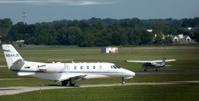 Cessna Citation Excel/XLS (N844JS) - Taxiing for the departing runway is this 2003 Cessna Citation Excel 560XLS from the Summer of 2021.