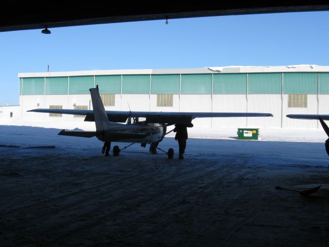 Cessna 152 (C-GQSY) - Wheeling the old girl out of the hangar for a winter afternoon flight, my last flight in 2012