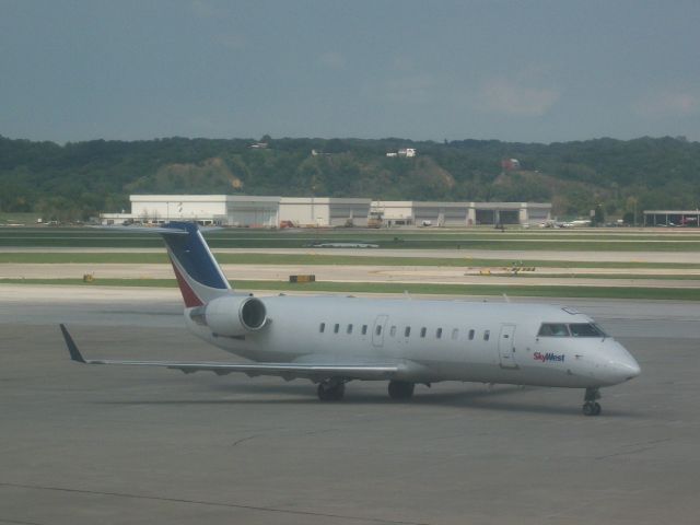 Canadair Regional Jet CRJ-200 (N988CA) - SkyWest 9753 from MKE.  This was the last mounth Sky West served Omaha (August 7,2011).