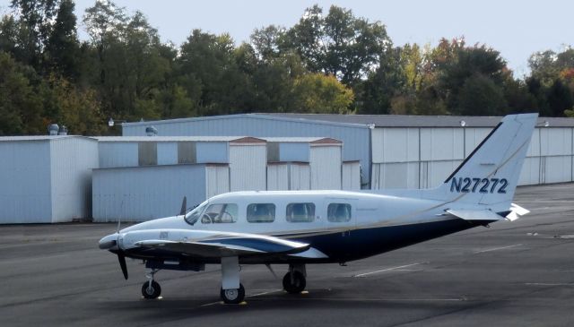 Piper Navajo (N27272) - Catching some tarmac time is this 1977 Piper Navajo PA-31-325 in the Autumn of 2020.