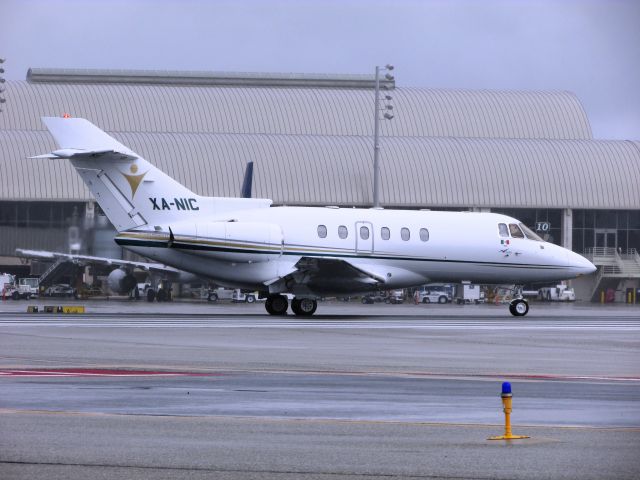 Hawker 800 (XA-NIC) - Line up and wait on RWY 20R