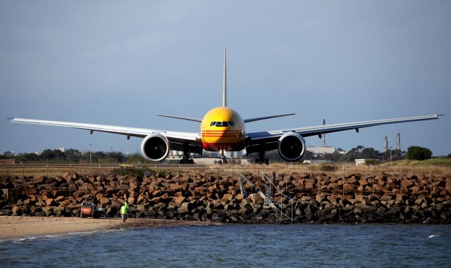 BOEING 777-200LR (N773CK) - Turning onto Taxiway Alpha