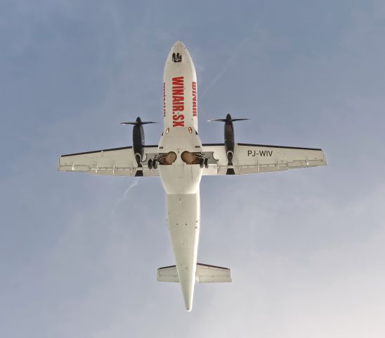PJ-WIV — - A belly shot of Winair Atr 42-300 while landing at TNCM
