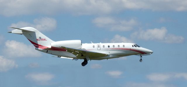 Cessna Citation X (N249AL) - On final is this 2005 Cessna Citation 750 in the Summer of 2020.