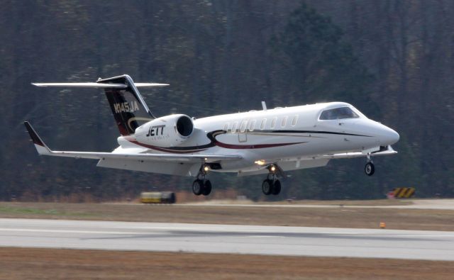 Learjet 45 (N145JA) - A Learjet 45 sits down on runway 31 at Falcon Field-Peachtree City, Ga.