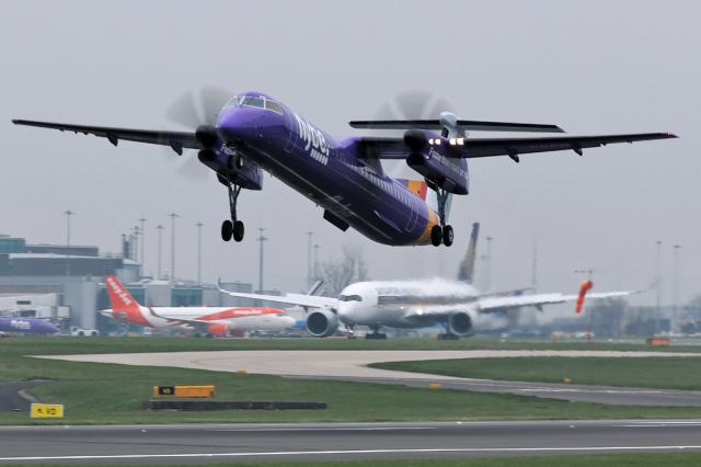 de Havilland Dash 8-400 (G-PRPN) - BEE472 off to Belfast BHD on a murky morning as SIA52 arrives in the background from SIN.