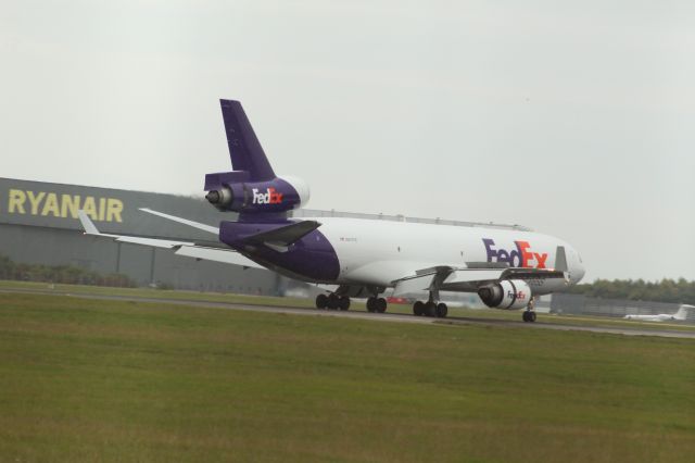 Boeing MD-11 (N617FE) - A FedEx McDonnell Douglas MD-11F slowing down after landing on runway 22 at London Stansted Airport.br /br /Location: London Stansted Airport.br /Date: 12.10.22 (dd/mm/yy).