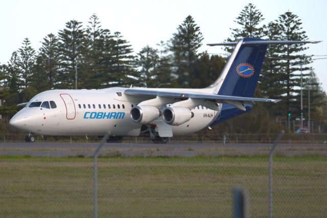 Avro RJ-100 Avroliner (VH-NJH) - Rolling for take-off on runway 05. Wednesday, 21st May 2014.