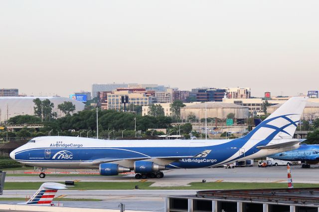 Boeing 747-200 (VP-BIK) - Air Bridge Carriers (RU) VP-BIK B747-46NF [cn35421]br /Chicago O’Hare (ORD). Air Bridge Carriers flight RU301 taxies to the stand after arriving from Moscow Sheremetyevo (SVO).br /Taken from roof level (6th Floor) parking garage A,br /2018 06 06br /a rel=nofollow href=http://alphayankee.smugmug.com/Airlines-and-Airliners-Portfolio/Airlines/EuropeanAirlines/Air-Bridge-Carriers-RU/https://alphayankee.smugmug.com/Airlines-and-Airliners-Portfolio/Airlines/EuropeanAirlines/Air-Bridge-Carriers-RU//a