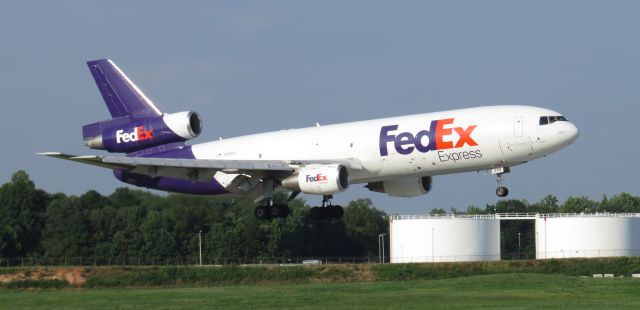 Boeing MD-11 (N399FE) - Taken from airport overlook. Arriving on 18c