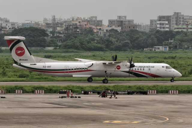 de Havilland Dash 8-200 (S2-AKF) - 28th August, 2024: Flight BG 482 from Rajshahi Shah Makhdoum taxiing to the ramp at Dhaka's Zia International Airport. 