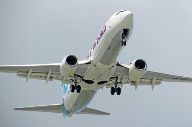 Boeing 737-700 (9Y-TAB) - On short final for Rwy 09.