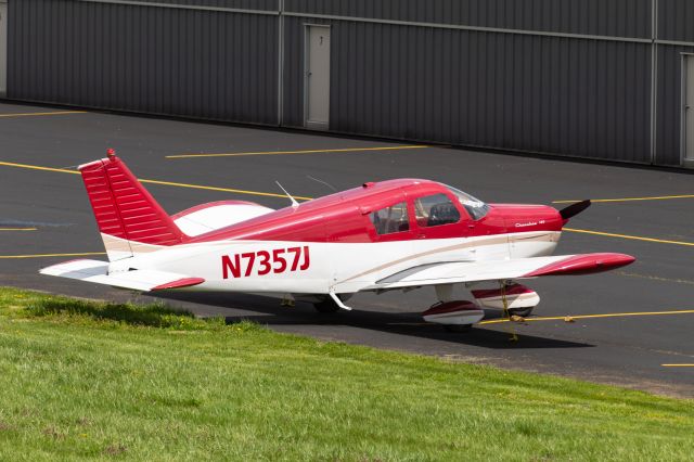 Piper Cherokee (N7357J) - A Piper Cherokee sitting outside the hangars at Lunken Airport.