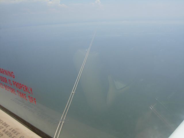 Beechcraft Bonanza (36) (N136JL) - Approaching Lakefront (KNEW) from the northwest; The Causeway over Lake Pontchartrain