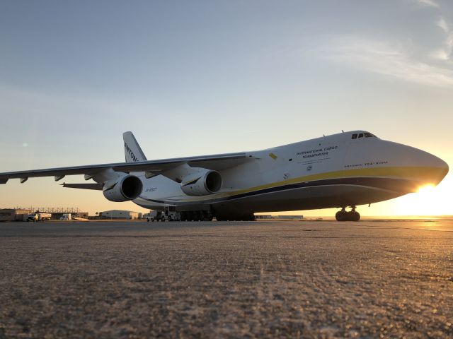 Antonov An-124 Ruslan (UR-82027) - Early morning waiting to fly supplies to Puerto Rico. Amazing how small one feels standing next to the giant.