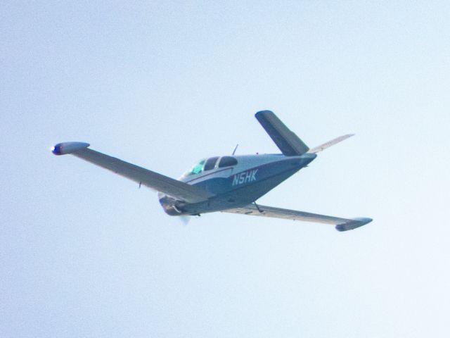 N5HK — - Taken from the roof of our parking garage with a Nikon P1000 as the plane continued east over the water.