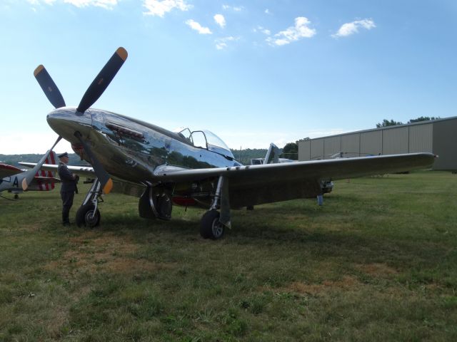 North American P-51 Mustang (N151AM) - a german officer inspecting a mustang at geneseo 2016