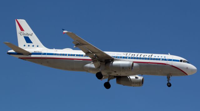 Airbus A320 (N475UA) - UAs retro paintbird N475UA flying Uniteds daily late morning arrival from Houston approaches Reno-Tahoe Internationals runway 34L about 25 minutes before both of the clocks hands are straight up.