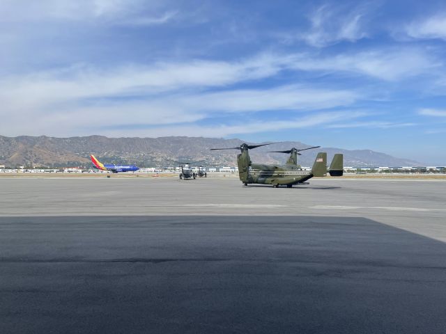 — — - Marine 1 and the V-22's waiting for Southwest to depart from BUR.