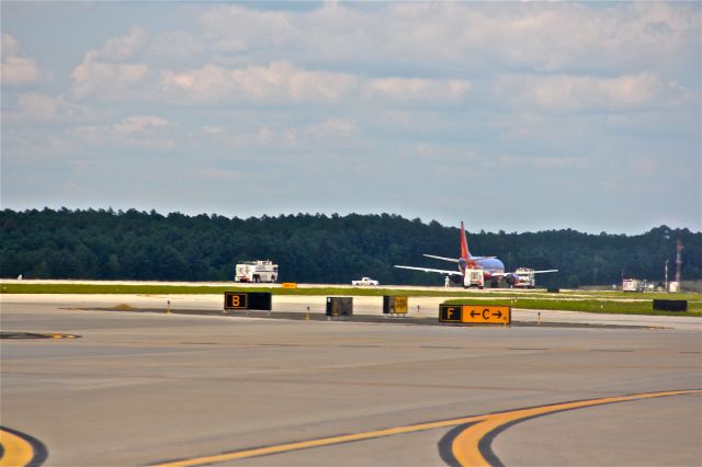 — — - RDU urgent landing, June 13, 2011 smoke in cockpit SWA