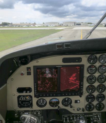 Beechcraft Super King Air 200 (N202FF) - Holding short of the active runway. 23 August 2015