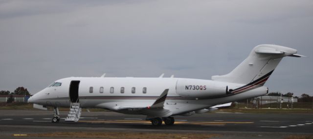 Canadair Challenger 350 (N730QS) - Catching some tarmac time on this IFR day is this 2016 Bombardier Challenger 350 in the Autumn of 2021.