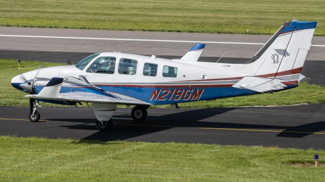 Beechcraft Baron (58) (N219GM) - N219GM taxiing to parking at College Park Airport after a flight from Clarksburg 