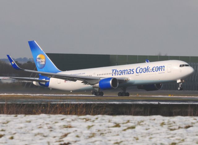 BOEING 767-300 (G-TCCA) - Thomas Cook B76.3W shows off its newly fitted winglets as it departs runway 05L