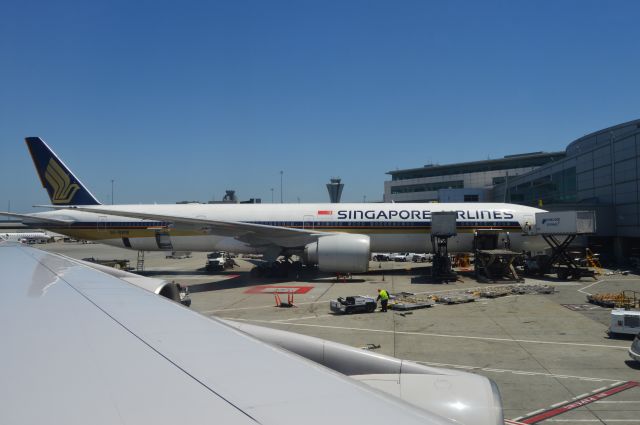 BOEING 777-300ER (9V-SWM) - Singapore Airlines 777 to Seoul. Taken on United 747