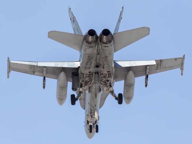 McDonnell Douglas FA-18 Hornet — - Approaching runway 01 at RAAF Townsville. Note the twin rudders deflected inwards, presumably providing drag.