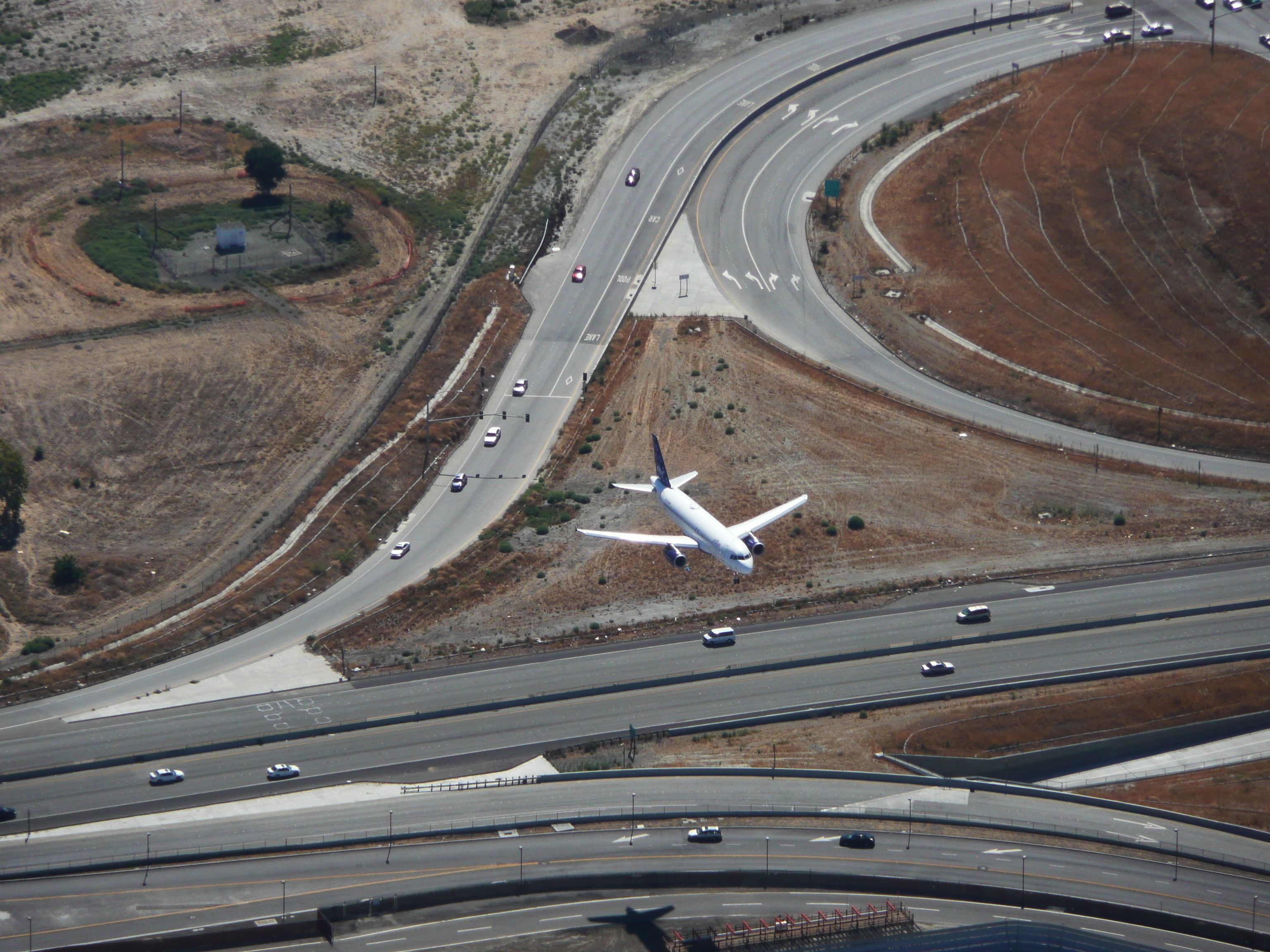— — - On approach to RWY 30L on September 25, 2010