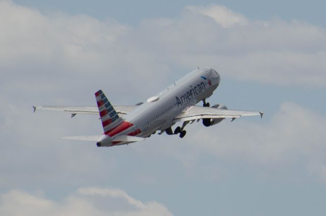 Airbus A320 (N656AW) - American 1859 is downwind Runway 31 moments after takeoff on his way to Phoenix Sky Harbor. Photo taken May 3, 2020 at 2:20 PM with Nikon D3200 at 400mm.