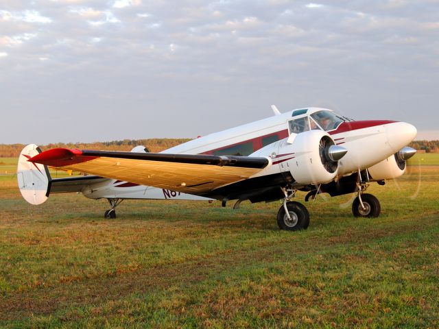 Beechcraft 18 (N87711) - This gorgeous Model 18 is warming up the oil in her engines on this cool morning before heading off to Winchester for the Beech Party Breakfast.