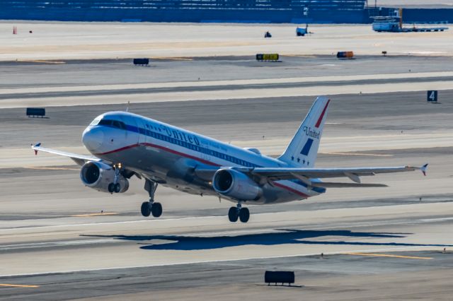 Airbus A320 (N475UA) - A United Airlines A320 in Friend Ship retro livery taking off from PHX on 2/11/23 during the Super Bowl rush. Taken with a Canon R7 and Canon EF 100-400 II L lens.