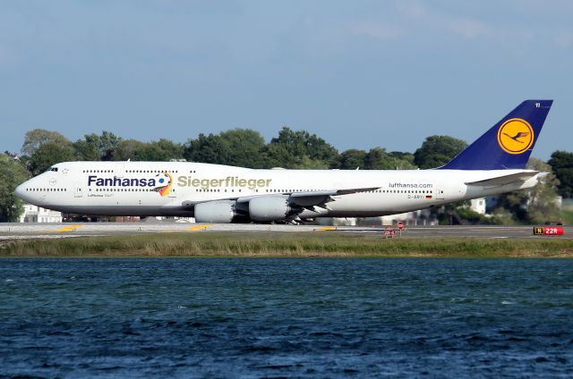 BOEING 747-8 (D-ABYI) - DLH 423 to Frankfurt holding on taxiway Mike for departure on 22R