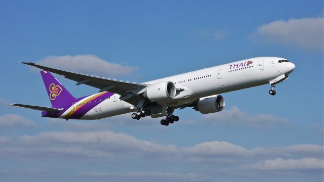 BOEING 777-300 (HS-TKN) - BOE274 flies a missed approach to runway 16R during a flight test on 4/1/13. (LN:1091 cn 41523).