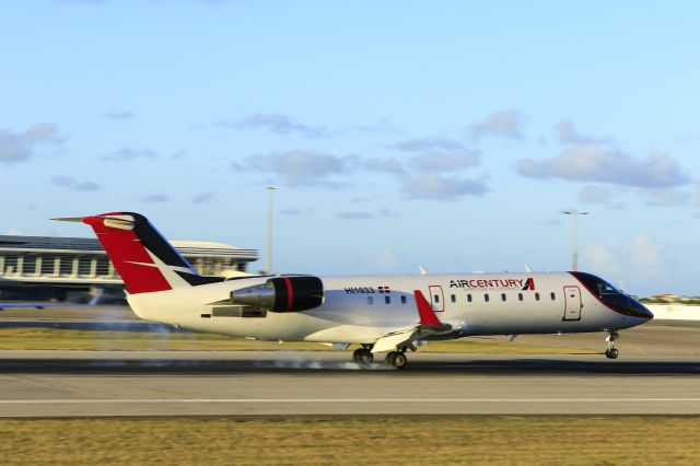 Canadair Regional Jet CRJ-200 (HI1033) - Air century HI1033 landing at TNCM St Maarten 