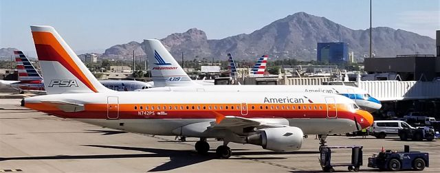 Airbus A319 (N742PS) - With N744P just on the other side.  28 Aug 18