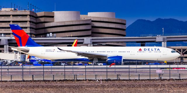 Airbus A330-900 (N409DX) - A Delta Airlines A330-900 taxiing at PHX on 2/23/23. Taken with a Canon R7 and Canon 100-400 EF ii lens.