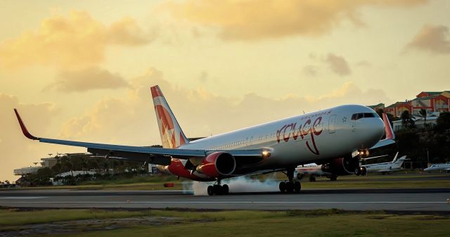 C-FIYE — - Air Canada landing at TNCM at sunset!!!