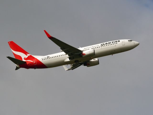 Boeing 737-800 (VH-VXD) - Getting airborne off runway 23 on a gloomy, cold winters day. Wednesday 4th July 2012.