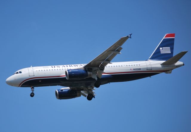 Airbus A320 (N655AW) - Final for 23 - 7/15/10